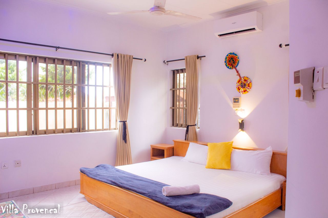 This master bedroom is spacious and attractive and is situated within a 2- bedroom villa (Ahenkrosei Villa). Like all of our bedrooms, it is ensuite and comes with a mini-fridge, AC, running hot water, flat screen tv and a ceiling fan.