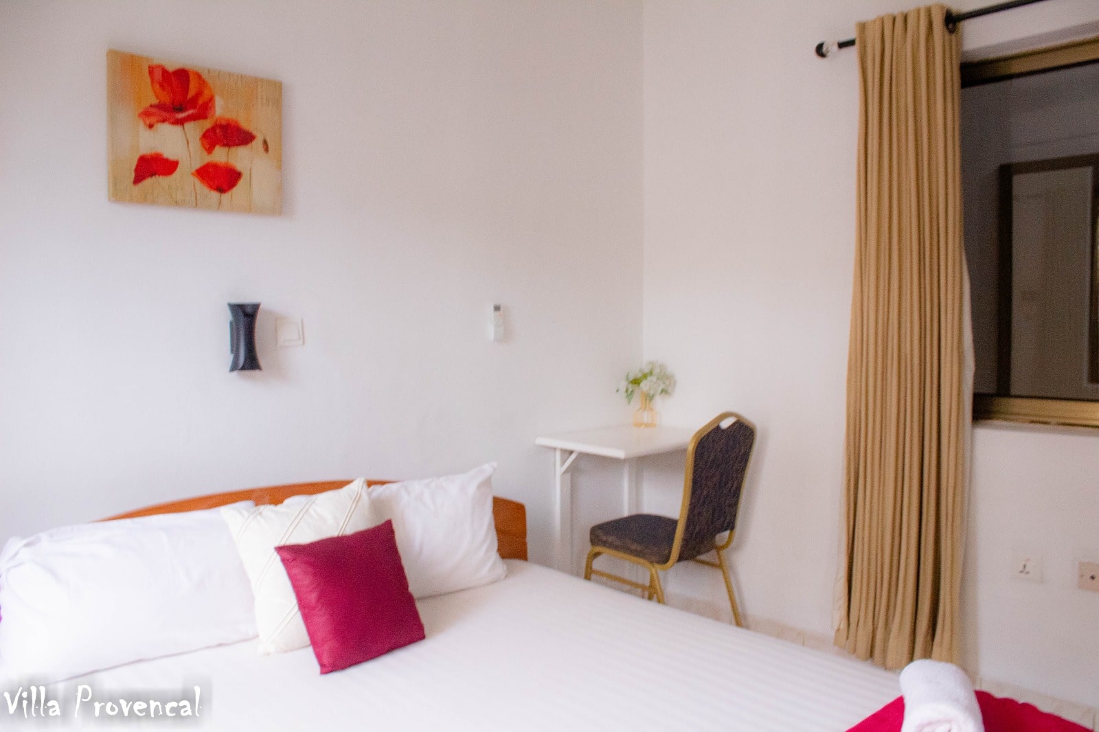 This cute and cosy double bedroom complements the master bedroom. It has its own mini fridge, tv, bathroom and WC.