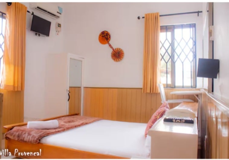 Room 2 is our cute and cosy double bedroom, which has a tv, mini fridge and an ensuite shower room and WC. It's perfect for a quick getaway.