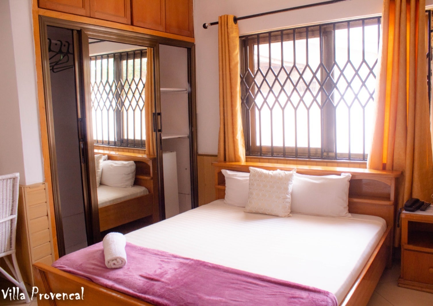 Room 3 is slightly larger than Room 2. It's also a serene double bedroom with a tv, mini fridge and an ensuite shower room and WC.