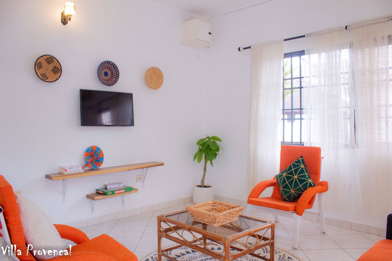 This beautiful two-bedroom ensuite villa opens into this charming living room, an elegant and homely space to entertain guests or simply enjoy some quiet time...